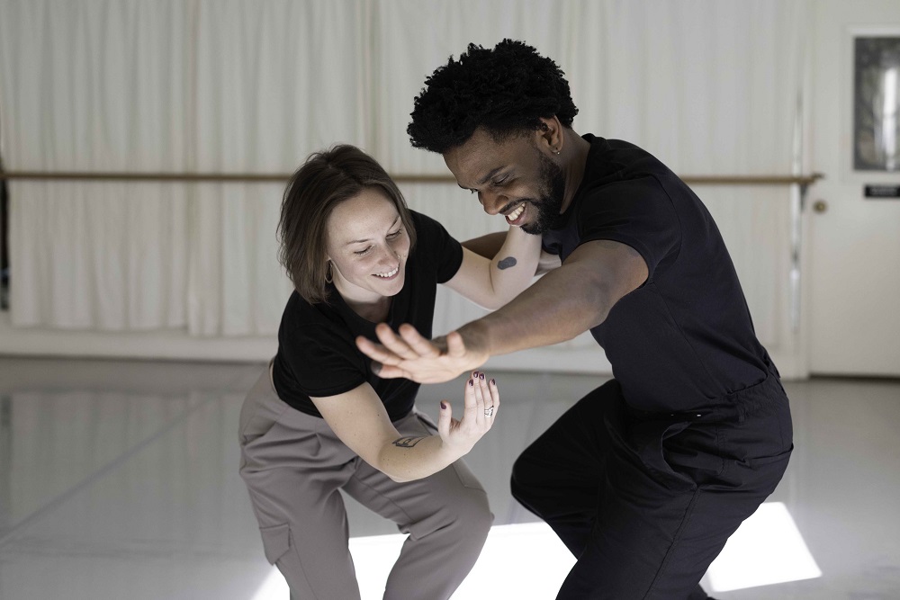 Two dancers in a studio