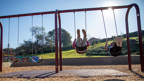 Kids on swings