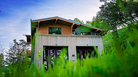 Firehouse surrounded by greenery