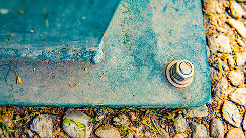 Steel beam bolted to concrete