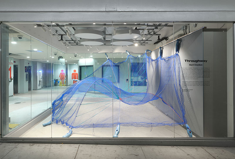 Blue net hanging in an undulating form