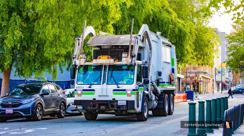 A City of Berkeley recycling truck rolls through the street