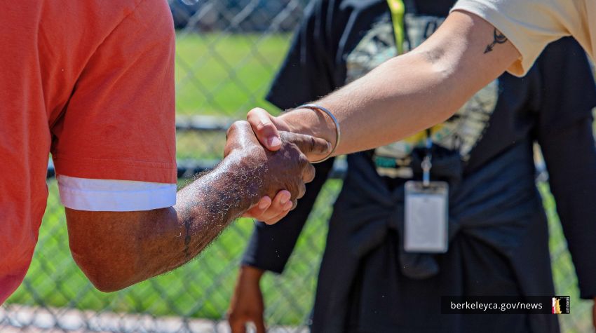 Two people shaking hands