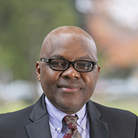 Headshot of Henry Oyekanmi